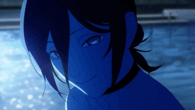 Close-Up Woman's Face Blue Background GIF