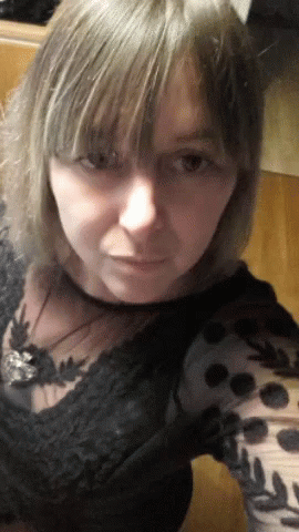 Close Up Woman's Face In Black Shirt GIF