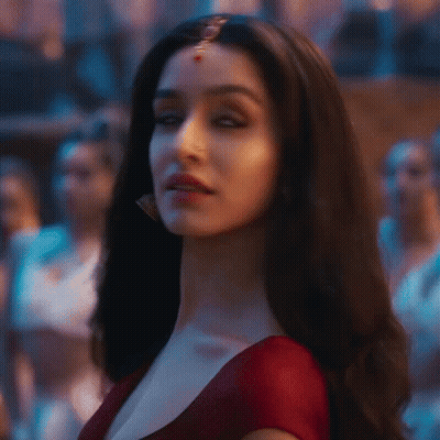Close Up Woman's Face In Red Top GIF