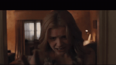 Close Up Woman's Face In Room GIF