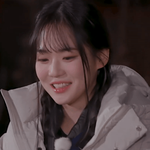 Close Up Woman's Face In White Jacket GIF