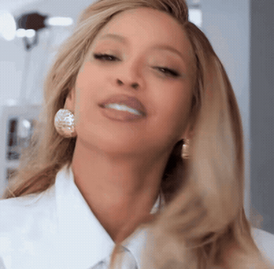 Close Up Woman's Face With Earrings GIF
