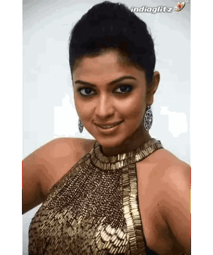 Close Up Woman's Face With Indiaglitz Sticker
