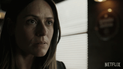 Close Up Woman's Face With Netflix Logo GIF