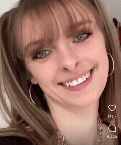 Close Up Woman's Face With Number 5420 GIF