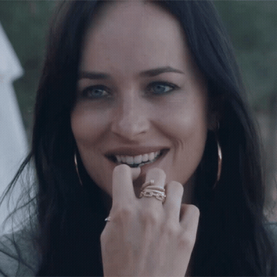 Close Up Woman's Face With Rings GIF