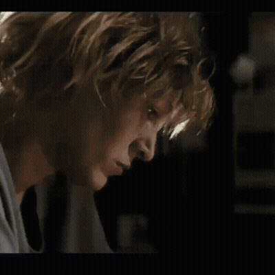 Close Up Woman's Serious Face GIF