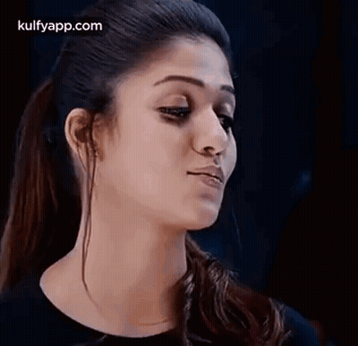 Close Up Woman Serious Face Black Background GIF