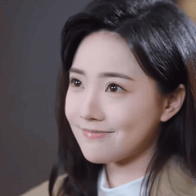Close Up Woman Smiling At Camera GIF