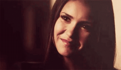Close Up Woman Smiling At Camera GIF