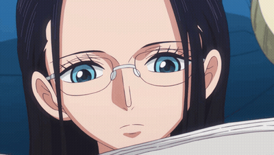 Close Up Woman Wearing Glasses Looking GIF
