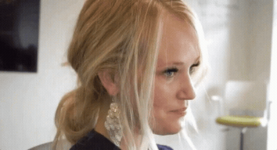 Close Up Woman With Blonde Hair And Earrings GIF