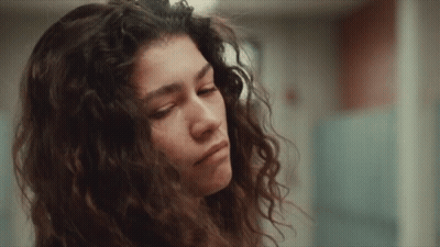 Close Up Woman With Curly Hair GIF