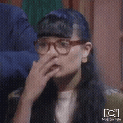 Close Up Woman With Glasses And Fringe GIF