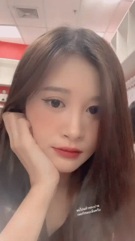Close Up Woman With Hand On Face GIF