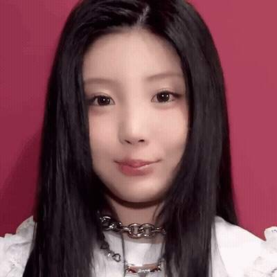 Close Up Woman With Long Black Hair And Necklace GIF