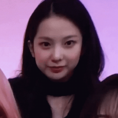 Close Up Woman With Long Black Hair And Purple Background GIF