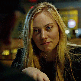Close-Up Woman With Long Blonde Hair And Blue Eyes GIF