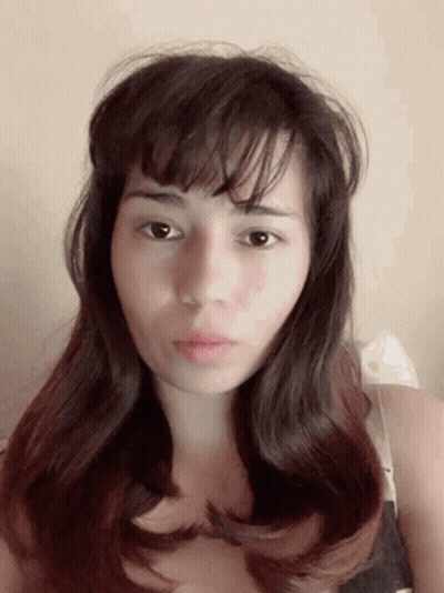 Close Up Woman With Long Hair GIF