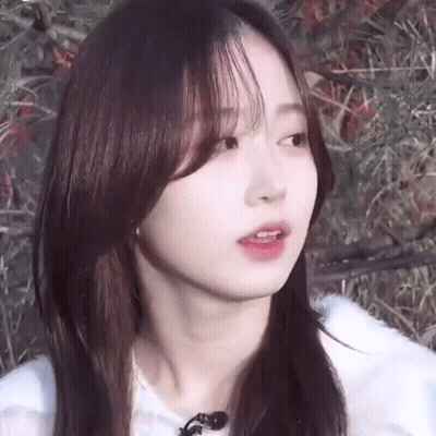 Close Up Woman With Long Hair And White Shirt GIF