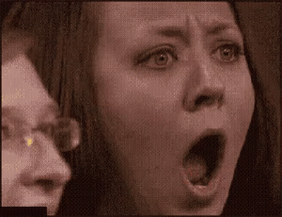 Close Up Woman With Mouth Open Man Behind GIF
