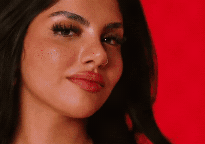 Close Up Woman With Nose Ring Red Background GIF