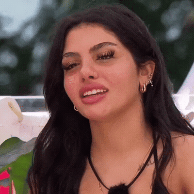 Close Up Woman With Open Mouth And Earrings GIF