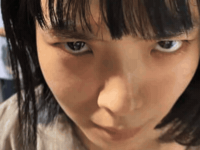 Close Up Woman With Serious Look GIF