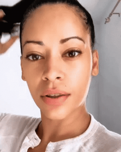 Close Up Woman Without Makeup Ponytail GIF