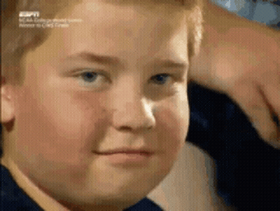 Close Up Young Boy Face With ESPN Logo GIF