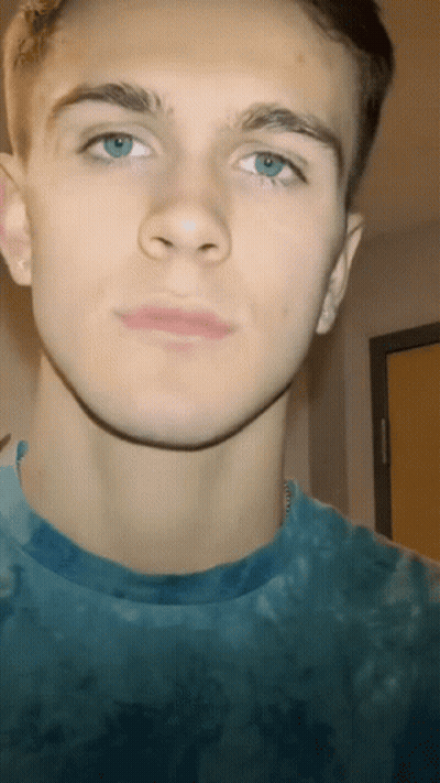 Close Up Young Man In Blue Shirt GIF