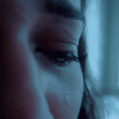 Closeup Of Woman's Eye With Tear GIF