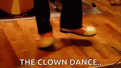 Clown Dancing On Wooden Floor GIF