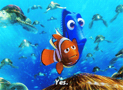 Clown Fish And Blue Fish Swimming Saying Yes GIF