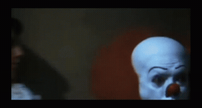 Clown Holding Hand To Face GIF