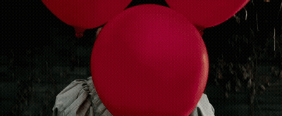 Clown Holding Red Balloon GIF