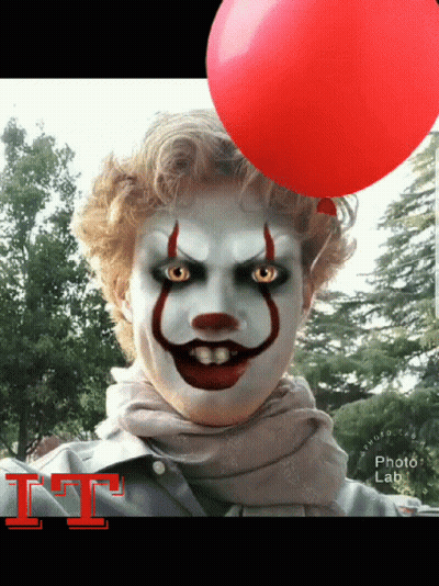 Clown Holding Red Balloon With Letter I GIF