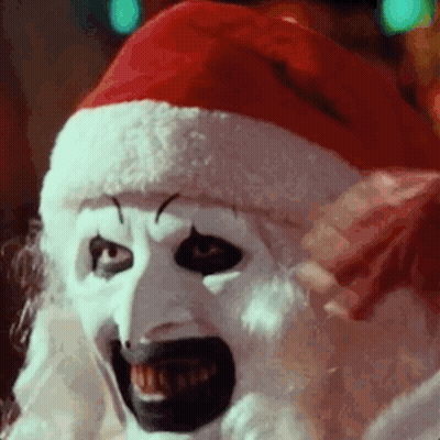 Clown In Santa Hat And White Mask GIF