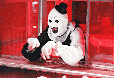 Clown In Top Hat Pointing Out Window GIF