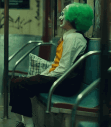 Clown Joker Laughing Alone At The Subway GIF