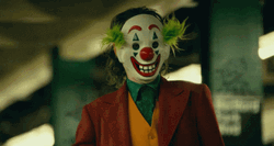 Clown Joker Laughing Removed His Mask GIF