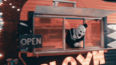 Clown Looking Out Window With Open Sign GIF