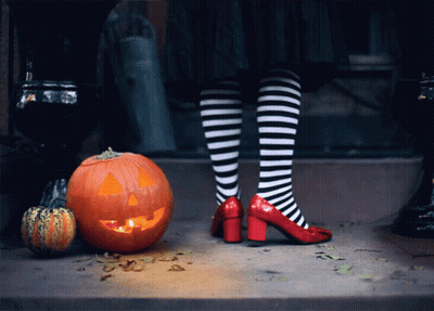 Clown On Cake With Candles And Lollipops GIF