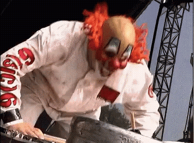 Clown Playing Keyboard On Stage GIF