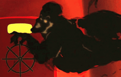 Clown Shadow On Red And Yellow Wall GIF