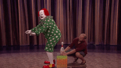 Clown  Sit On A Bowling Pin GIF