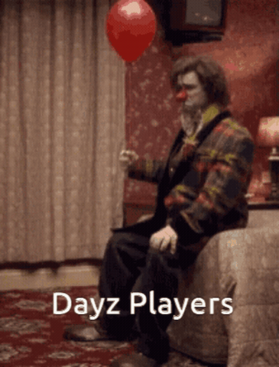 Clown Sitting On Bed Holding Red Balloon GIF