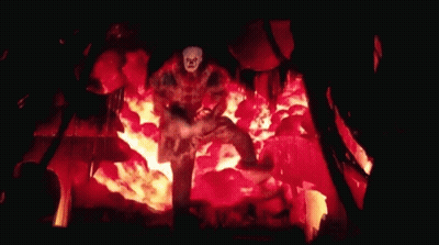 Clown Standing In Burning Building GIF