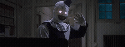 Clown With Glowing Eyes Hand Outstretched