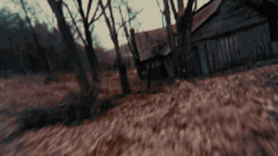 Clown With Red Hair And Red Nose Touching Head GIF